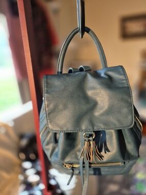 Indigo Faux Leather Navy Backpack with Tassel Accents